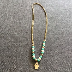 Eye/hand beaded chain with floral beads necklace